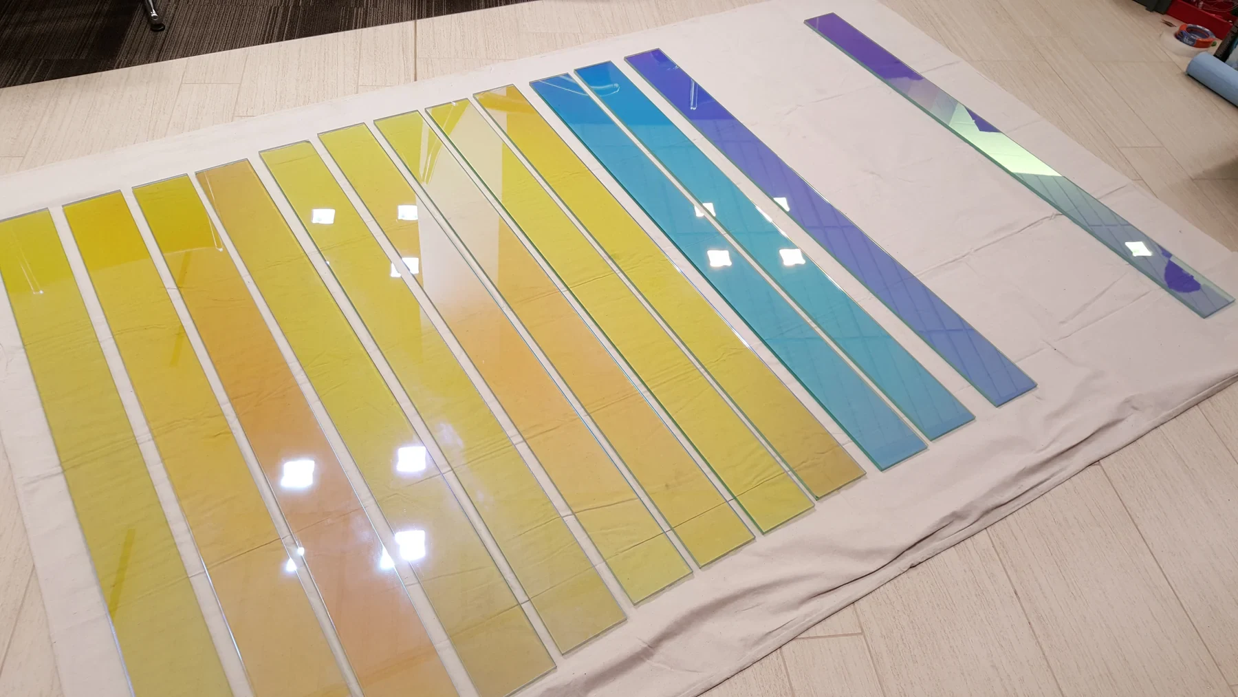Dichroic glass elements organized for Sky Veil
